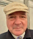 Helmut Scholz mit heller Schirmmütze und dunkler Jacke.