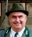 Martin Lüttgen mit Jägerhut und grüner Uniform.
