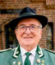 Paul Müller mit Jägerhut und grüner Uniform.